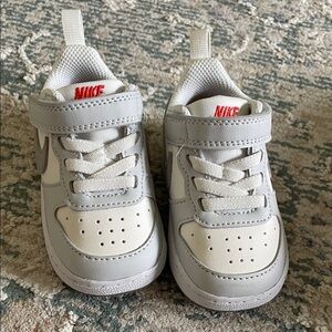 Nike White and Light Gray Sneakers for Baby.